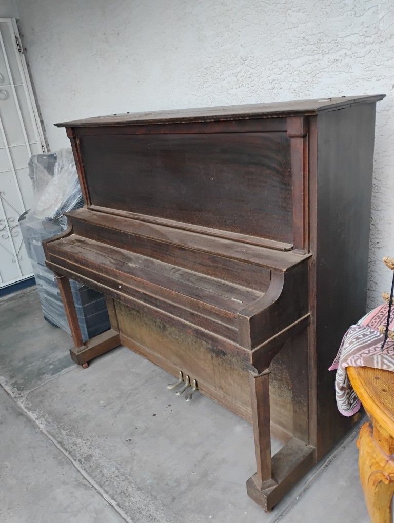 Rembrandt upright grand piano. Make offer. You haul.