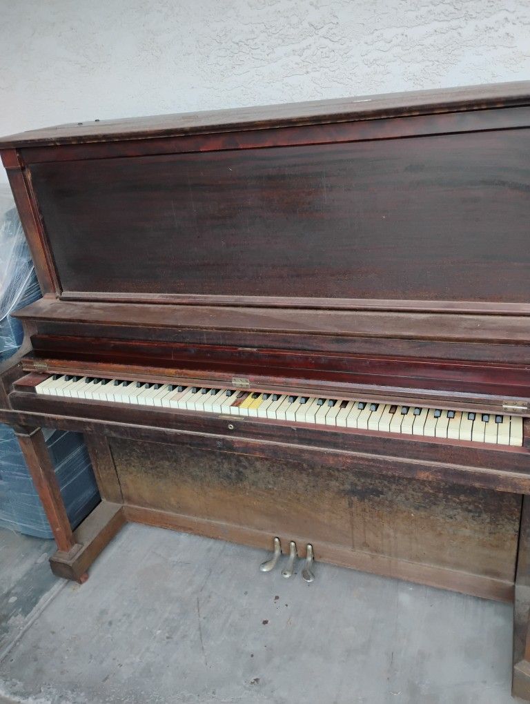 Rembrandt upright grand piano. Make offer. You haul.