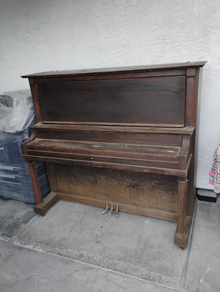 Rembrandt upright grand piano. Make offer. You haul.